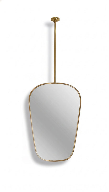 Organic suspended brass mirror with ceiling-mounted rod on white background.