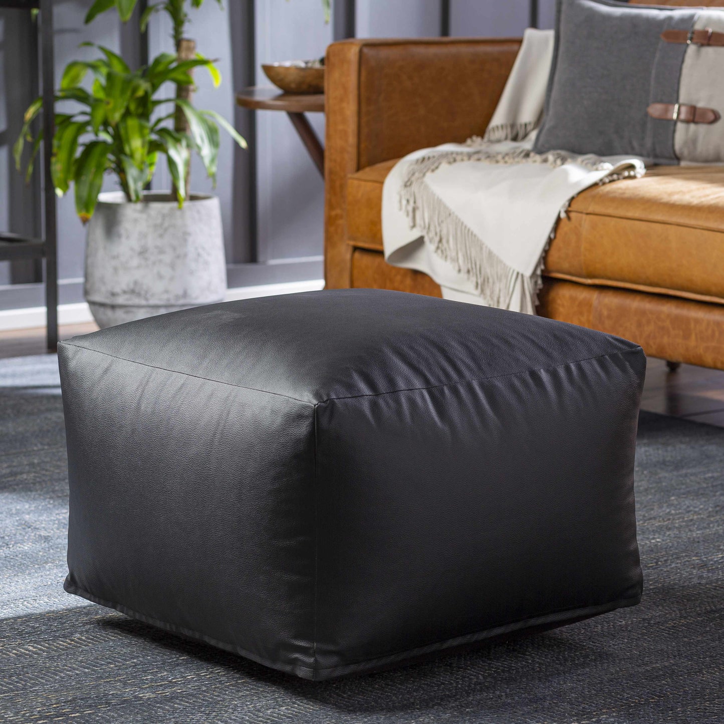Petersville Pouf Black Southwestern Faux Leather Accent Stool
