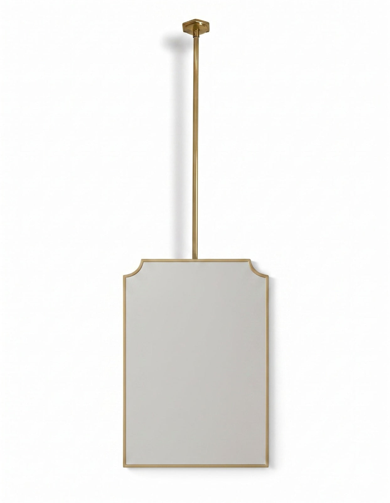 Handmade suspended brass mirror with gold frame on white background.