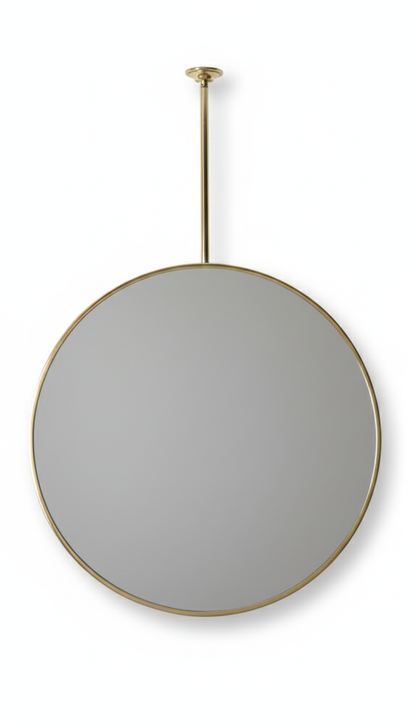 Suspended Round Brass Mirror in a white background. 