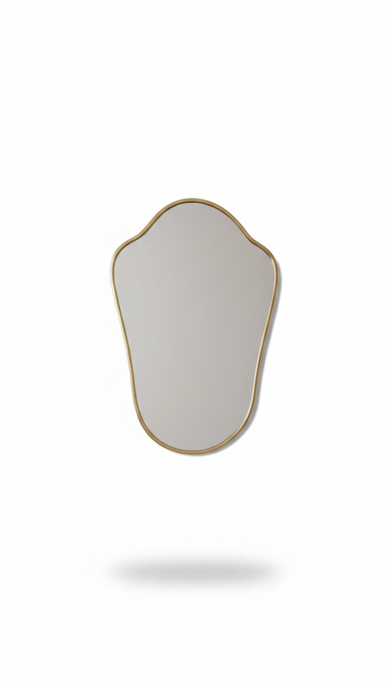 Shield brass wall mirror isolated on white background