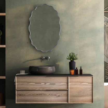 silver frame Flower Mirror in green wall on bathroom with silver faucet 