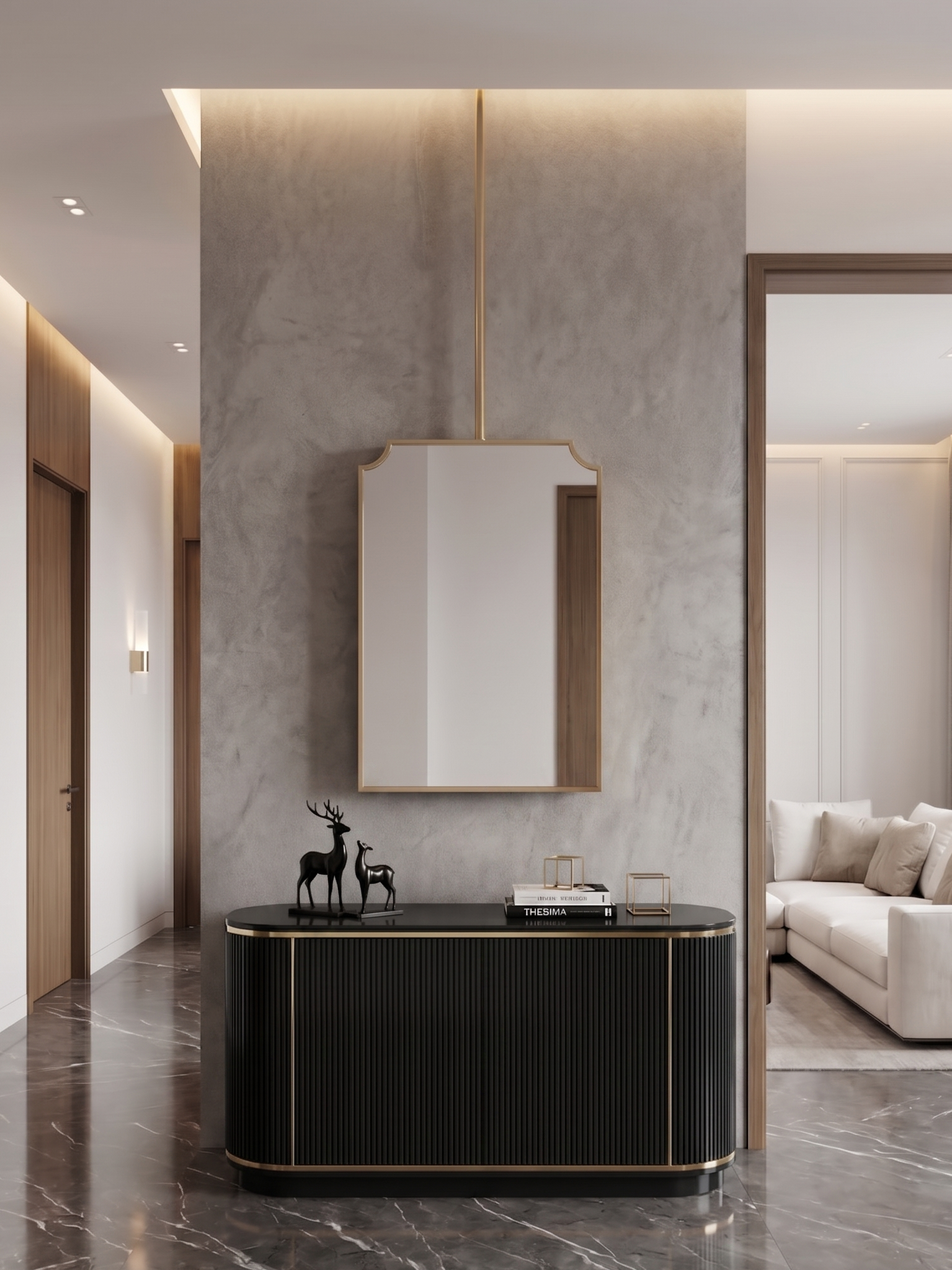 Hanging brass mirror above black console in contemporary hallway.