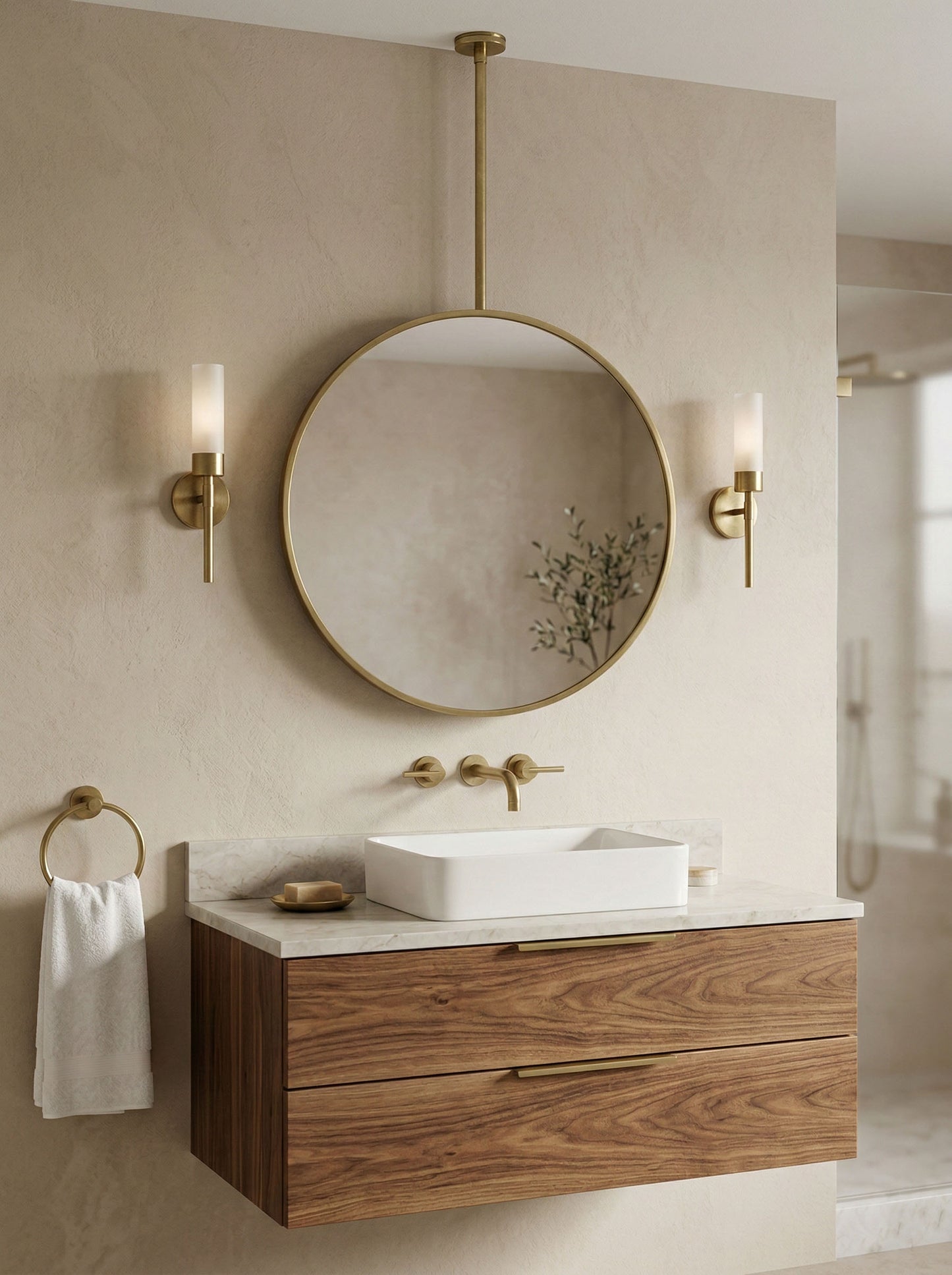 Modern ceiling mounted round mirror with brass frame and wood vanity