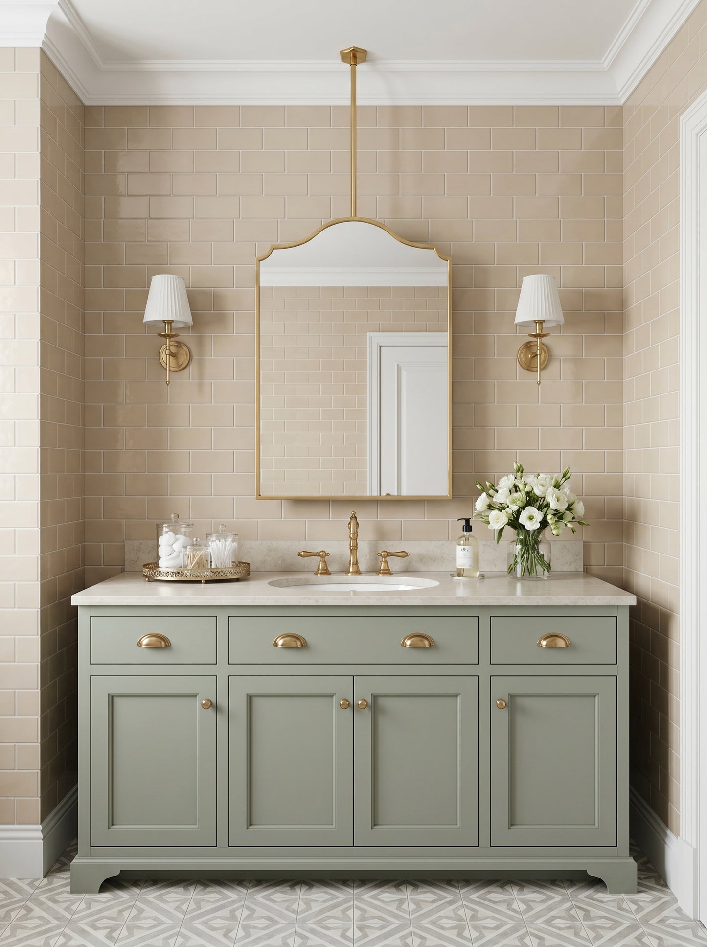 Handmade brass hanging mirror above a traditional bathroom vanity with beige subway tiles.