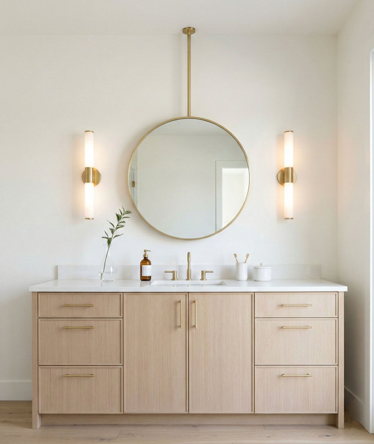 Minimalist round suspended mirror with vertical brass rod