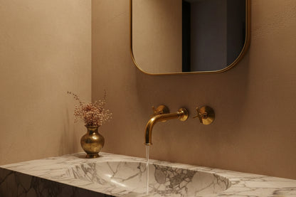 Marble integrated sink with brass wall mixer and decorative vase