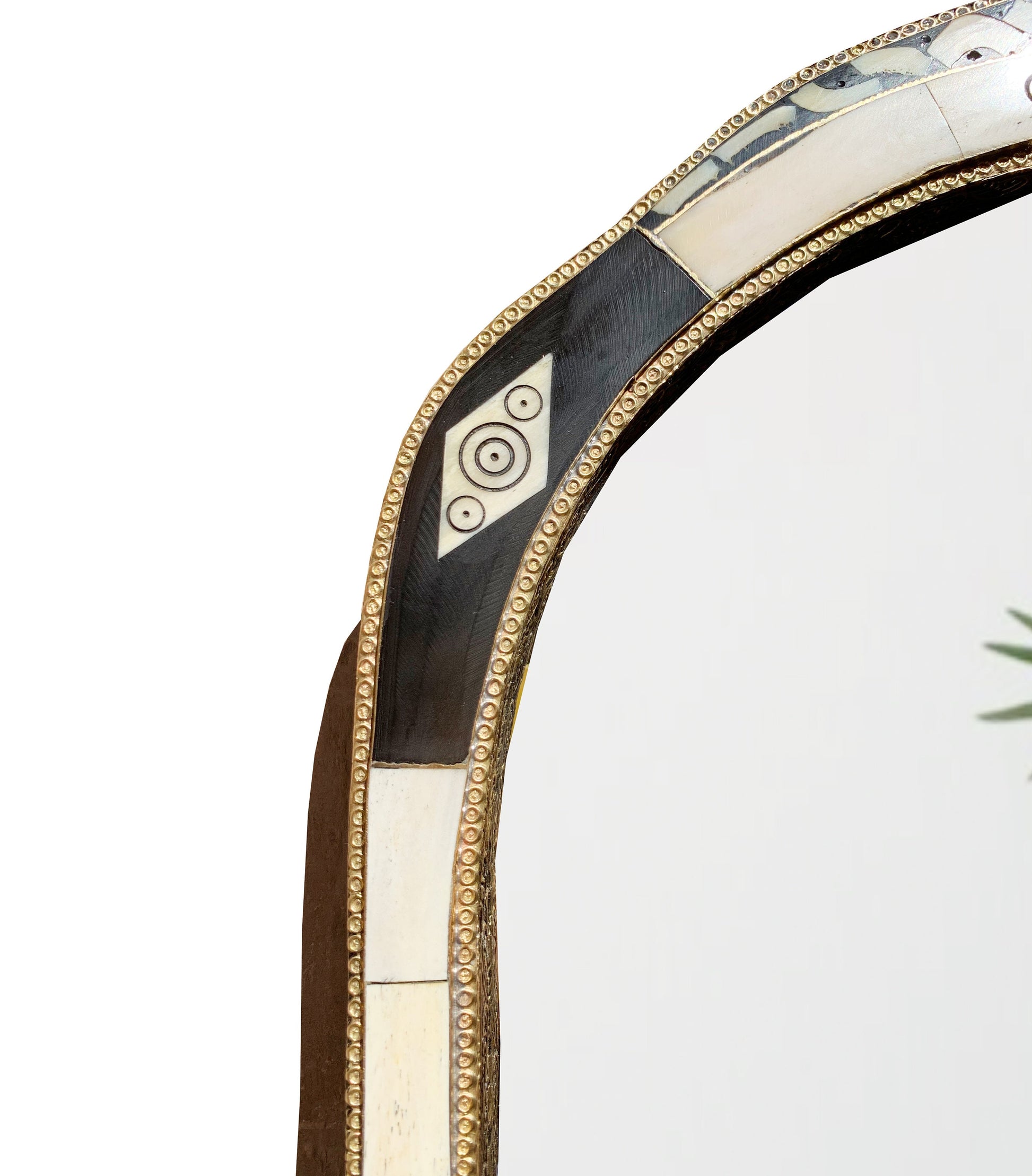 a mirror that has a design on it