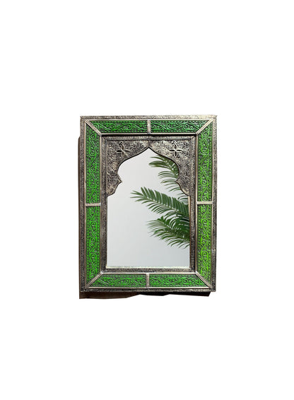 a mirror with a palm tree on it