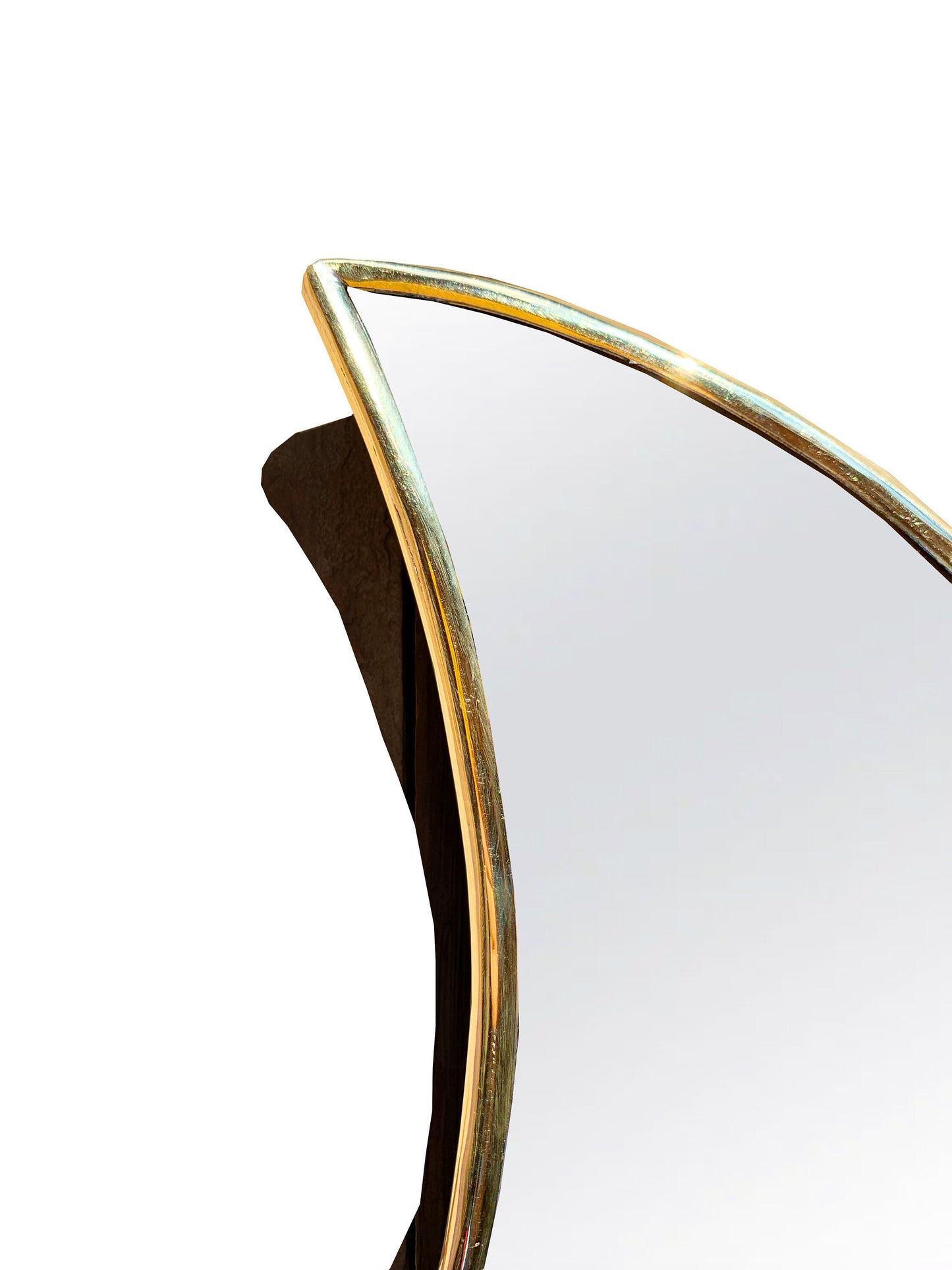 a mirror with a curved edge on a white background