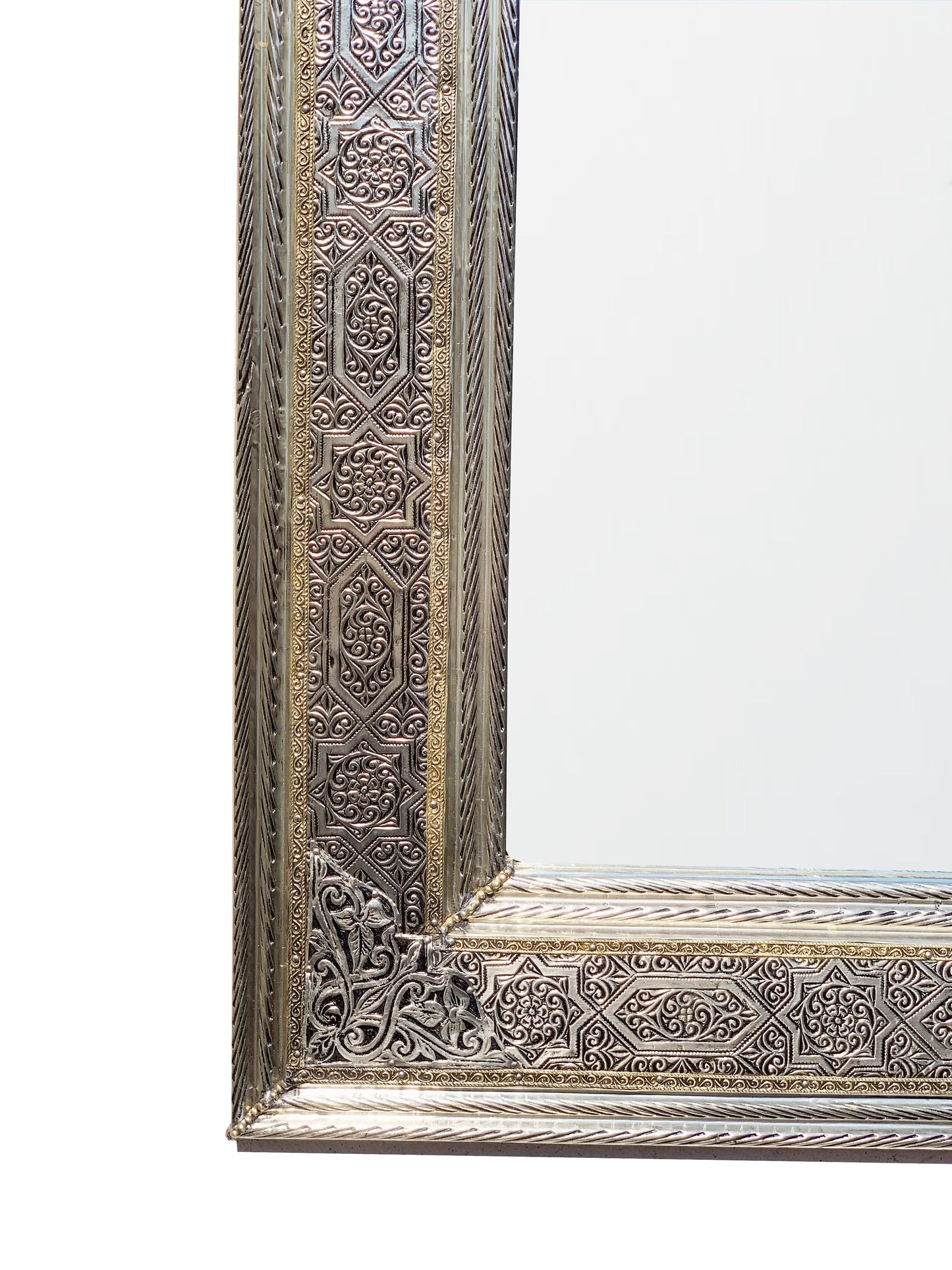 a silver and gold framed mirror on a white background