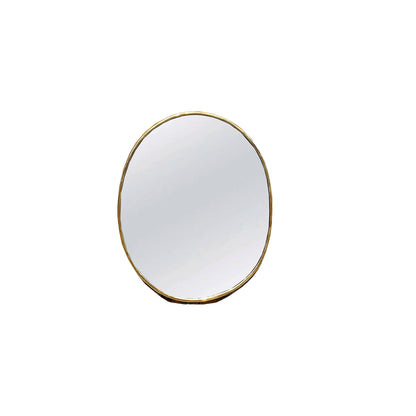 a round mirror on a white wall