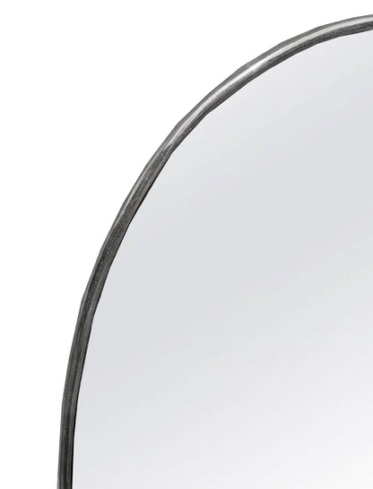 a mirror with a curved metal frame on a white background