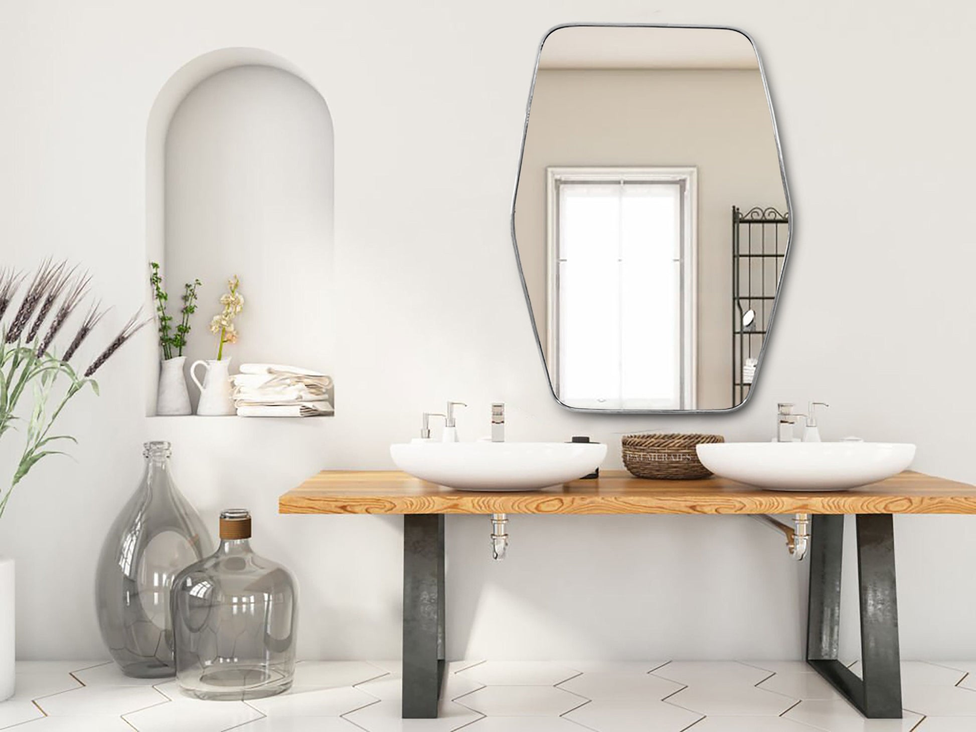 a bathroom with two sinks and a large mirror