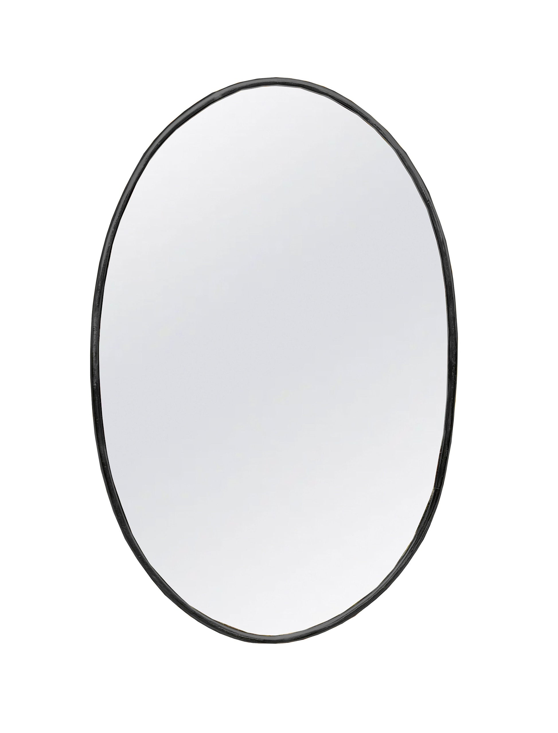 a round mirror on a white wall