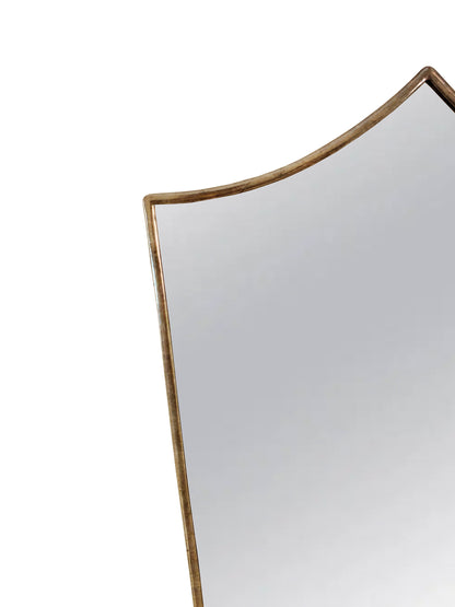 a mirror with a curved edge on a white background