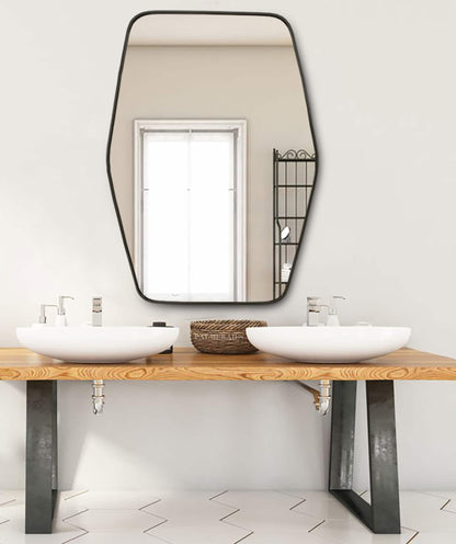 a bathroom with two sinks and a large mirror