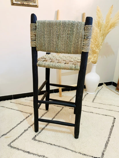 a close up of a chair on a rug