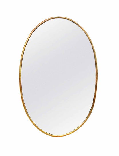 a oval antique brass mirror with a gold rim on a white background