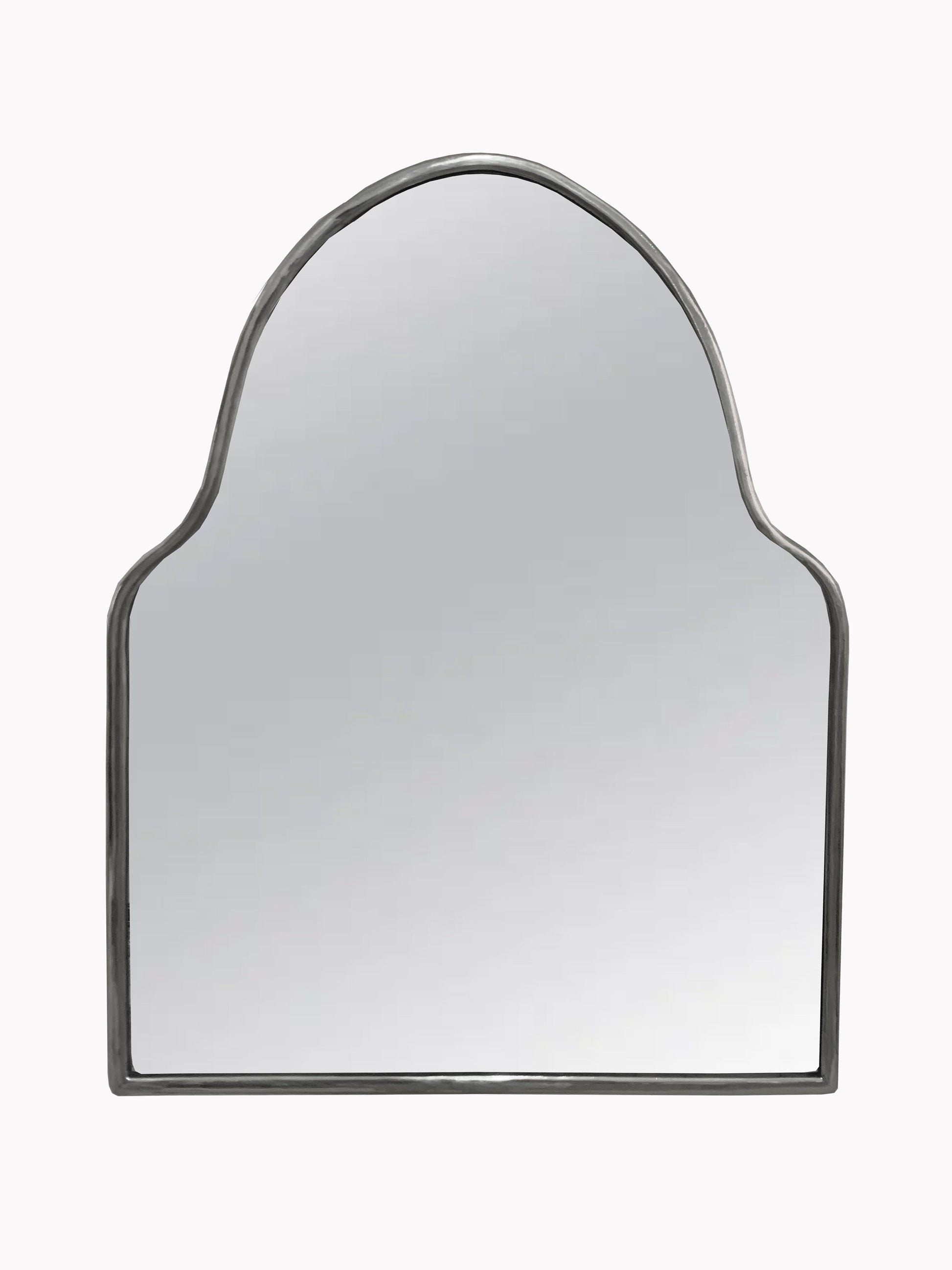 a mirror that is on a white wall