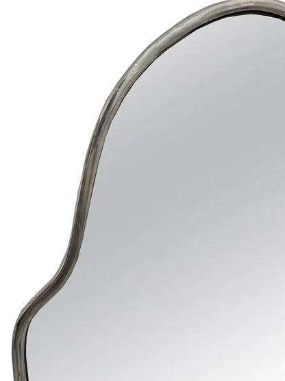 a mirror that is shaped like a curve