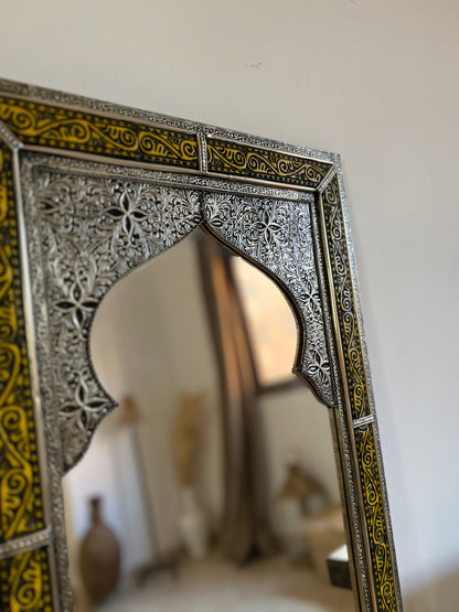 a mirror that is sitting on a table