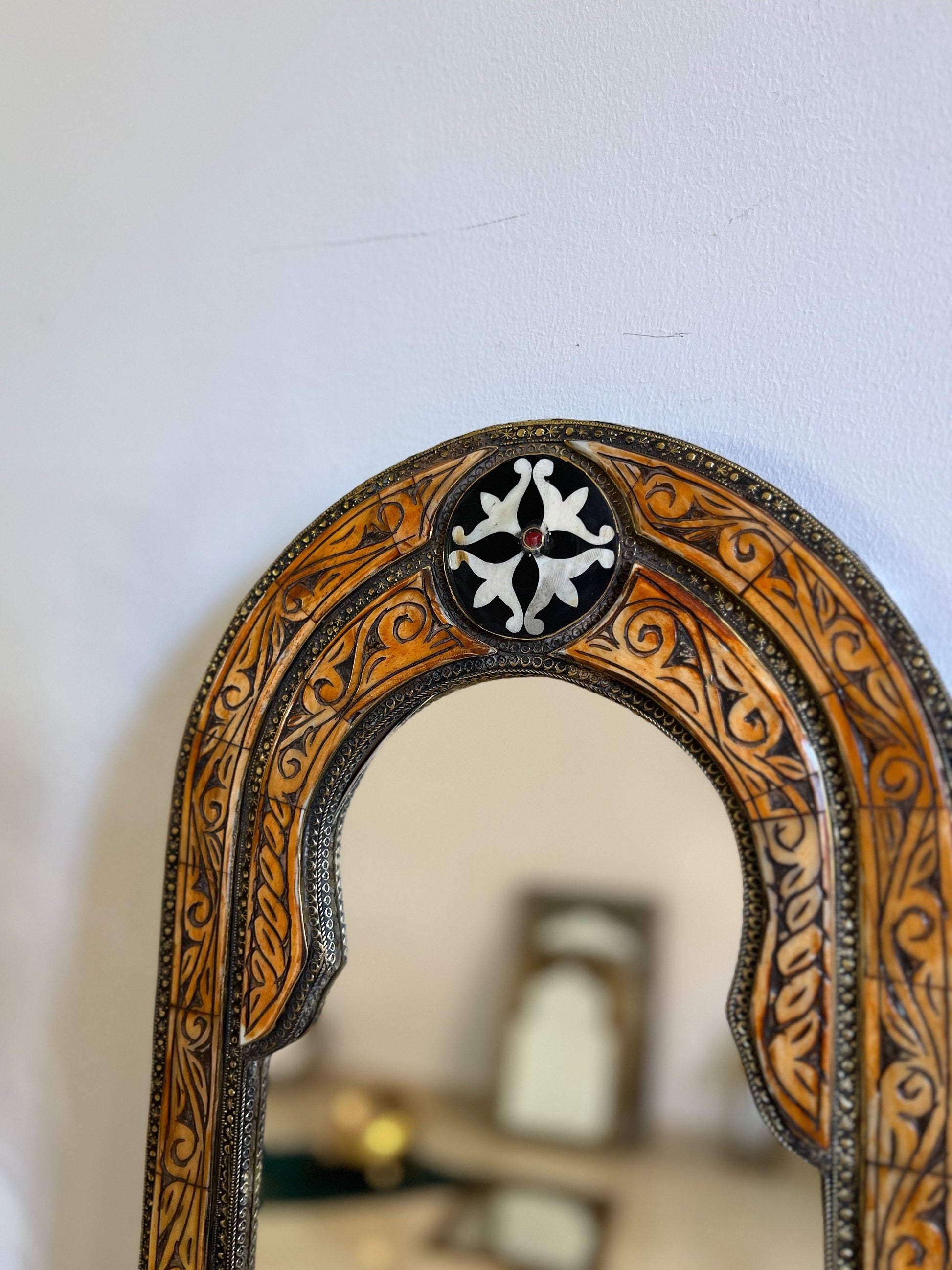 a mirror that has a clock on it